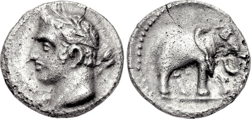 Carthaginian silver coin showing an elephant with a rider holding a goad.