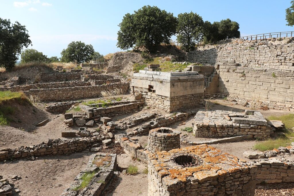 From Myth to History at Troy: excavations at Hisarlik revealing fortifications and layers.