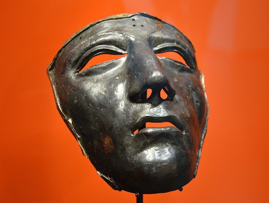 Display-mounted Roman cavalry face mask with silvered iron.