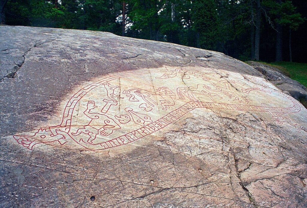 Ramsund carving of Sigurd visualising a Norse Hero's Journey in Ancient Myths.License: CC BY-SA 4.0.