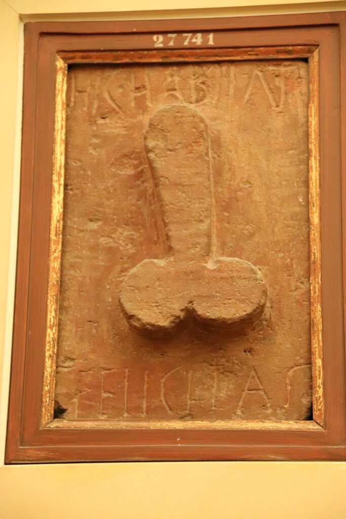 Stone relief with phallus and the inscription “Hic habitat felicitas”.