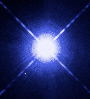 Hubble image showing bright Sirius A with faint white dwarf companion Sirius B