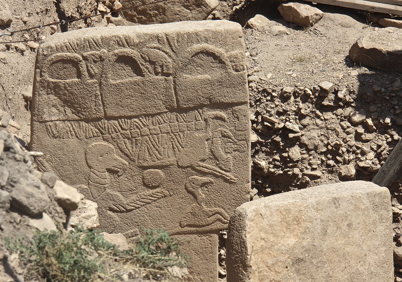 Pillar 43 at Göbekli Tepe with carved vultures and symbols.